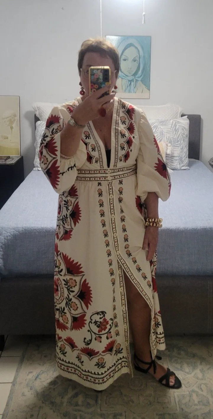 Cláudia M.